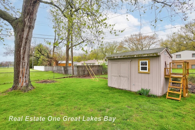 1416 Airfield Ln, Midland, MI 48642 - view of yard featuring an outdoor structure and a shed