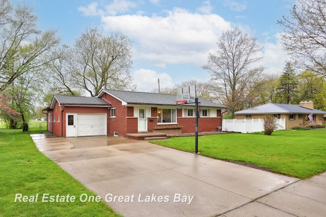 1416 Airfield Ln, Midland, MI 48642 - single story home featuring an attached garage, brick siding, and concrete driveway