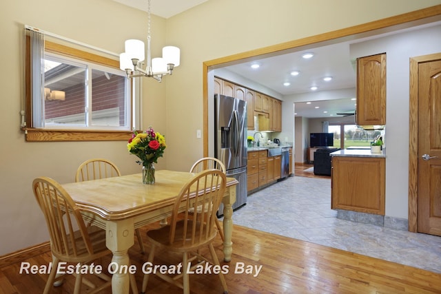 1416 Airfield Ln, Midland, MI 48642 - dining room featuring a chandelier, recessed lighting, light wood finished floors, and baseboards