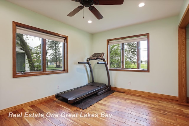 1416 Airfield Ln, Midland, MI 48642 - exercise room featuring baseboards, a ceiling fan, wood finished floors, and recessed lighting