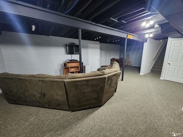 912 Kings Park Rd, Monroe, MI 48161 - carpeted living area featuring stairway