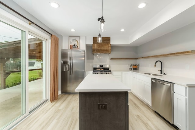 3246 Millwall Ave, Keego Harbor, MI 48320 - kitchen featuring appliances with stainless steel finishes, a sink, custom exhaust hood, light wood-type flooring, and light countertops