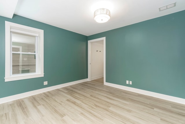 3246 Millwall Ave, Keego Harbor, MI 48320 - spare room with light wood finished floors and baseboards