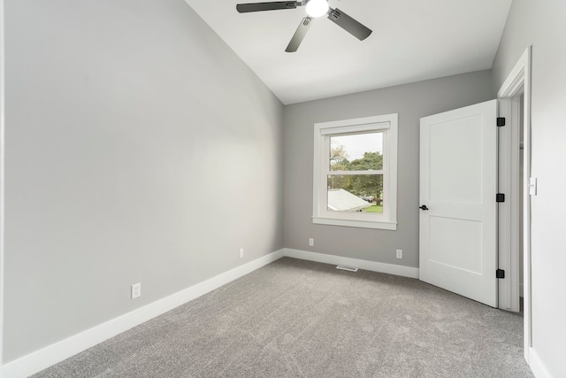 3246 Millwall Ave, Keego Harbor, MI 48320 - empty room with carpet floors, baseboards, and a ceiling fan