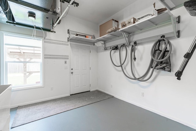 3246 Millwall Ave, Keego Harbor, MI 48320 - garage featuring baseboards