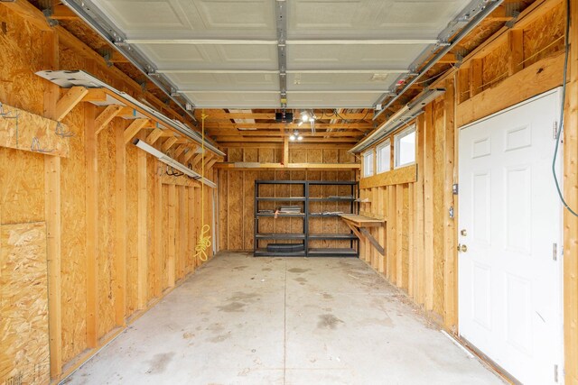 3246 Millwall Ave, Keego Harbor, MI 48320 - garage featuring a garage door opener