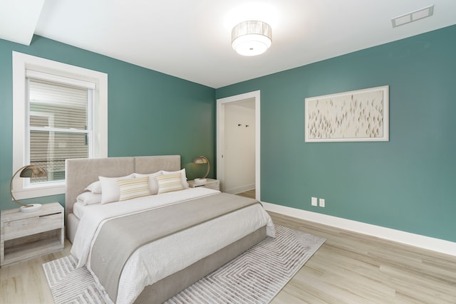 3246 Millwall Ave, Keego Harbor, MI 48320 - bedroom with wood finished floors and baseboards