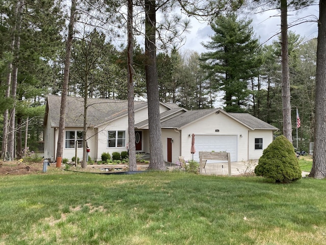 ranch-style house featuring a garage, a front lawn, and a shingled roof