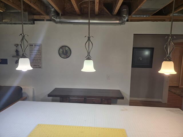bedroom with wood finished floors
