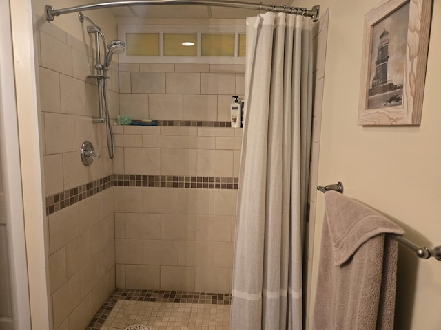 bathroom with a stall shower