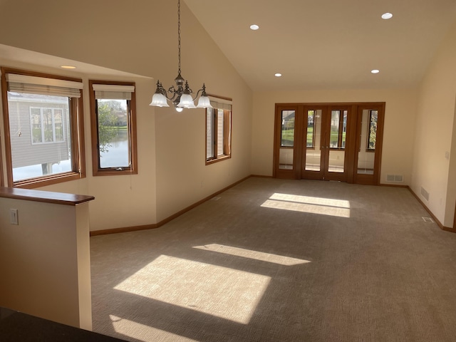 1712 Lisa Dr SW, Byron Center, MI 49315 - spare room featuring plenty of natural light, carpet floors, a chandelier, recessed lighting, and baseboards