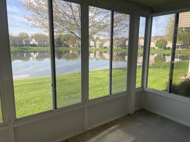 1712 Lisa Dr SW, Byron Center, MI 49315 - unfurnished sunroom with a water view and a residential view