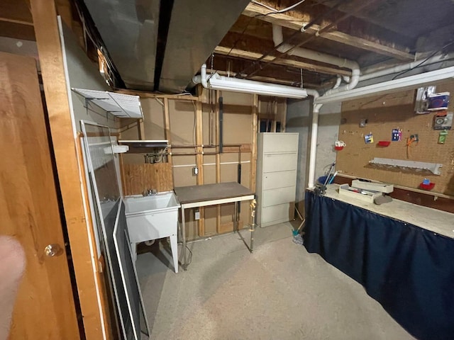 1712 Lisa Dr SW, Byron Center, MI 49315 - unfinished basement featuring a sink