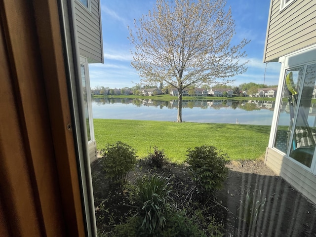 1712 Lisa Dr SW, Byron Center, MI 49315 - view of green lawn with a water view