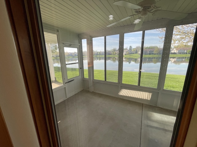 1712 Lisa Dr SW, Byron Center, MI 49315 - unfurnished sunroom with a water view and a ceiling fan