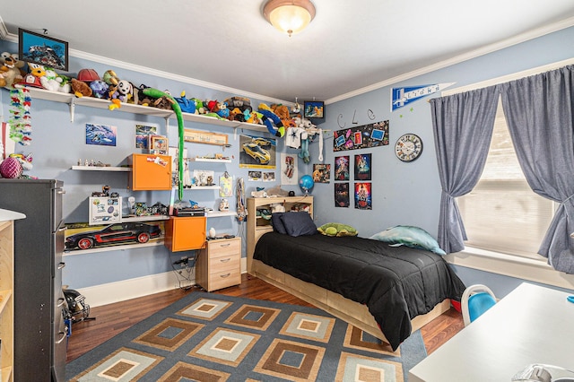bedroom featuring ornamental molding and dark wood-style flooring