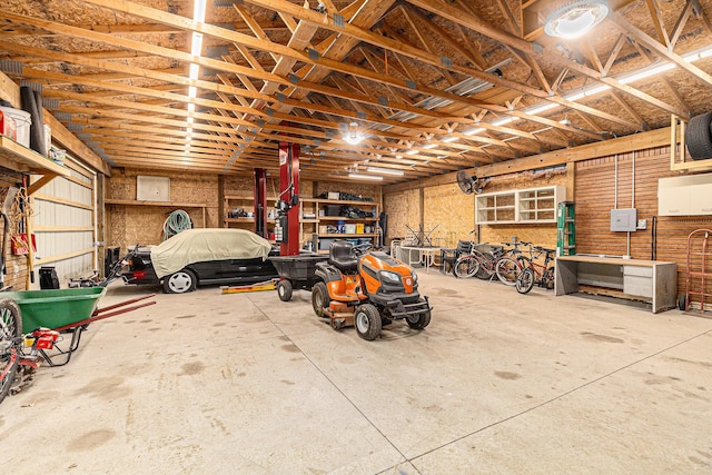 garage with a workshop area
