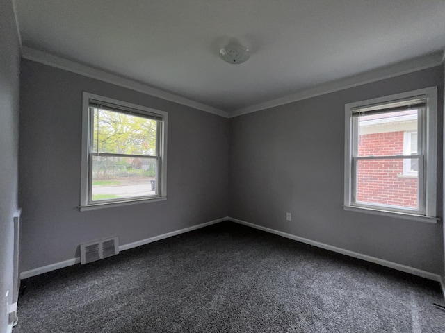 9960 Tecumseh, Redford, MI 48239 - unfurnished room with ornamental molding, dark colored carpet, and baseboards