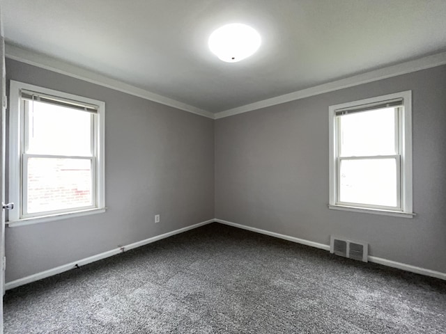 9960 Tecumseh, Redford, MI 48239 - unfurnished room with crown molding, dark carpet, and baseboards