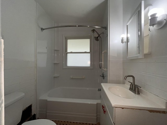 9960 Tecumseh, Redford, MI 48239 - bathroom with toilet, tile walls, tub / shower combination, vanity, and backsplash