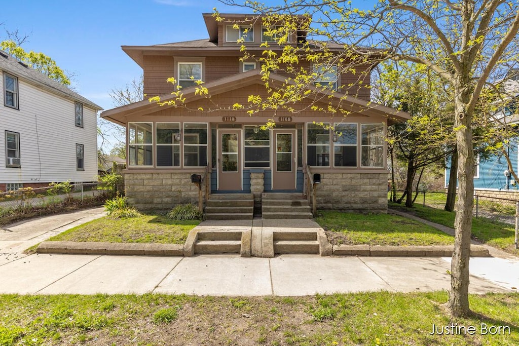 1108-1110 SE Baxter St SE, Grand Rapids, MI 49506 - american foursquare style home with entry steps and stone siding