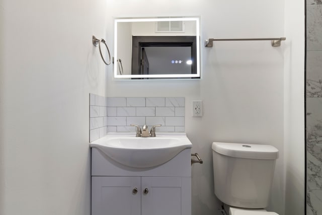 19178 Sherwood St, Detroit, MI 48234 - bathroom with tasteful backsplash, vanity, and toilet