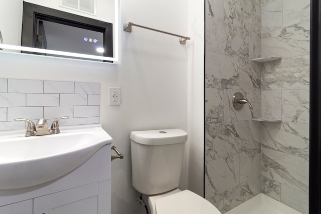 19178 Sherwood St, Detroit, MI 48234 - full bath featuring toilet, a shower stall, vanity, and decorative backsplash