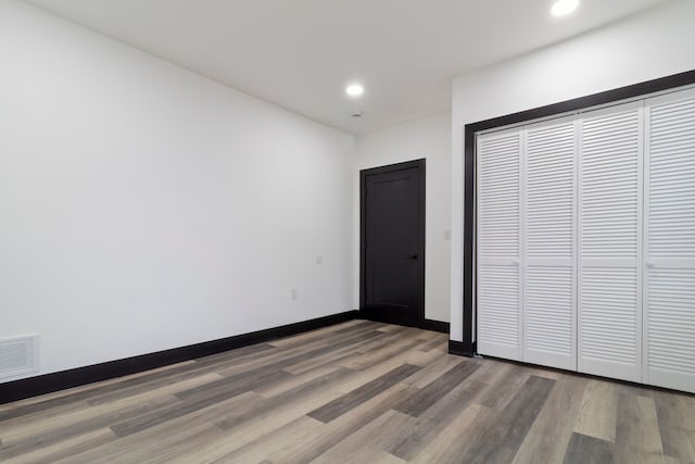 19178 Sherwood St, Detroit, MI 48234 - unfurnished bedroom featuring wood finished floors, recessed lighting, a closet, and baseboards