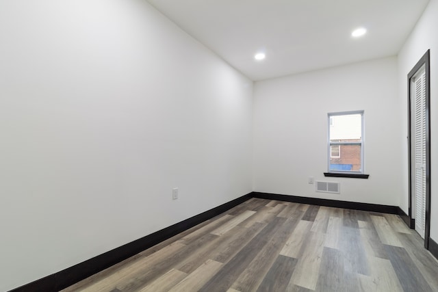19178 Sherwood St, Detroit, MI 48234 - unfurnished room with wood finished floors, recessed lighting, and baseboards