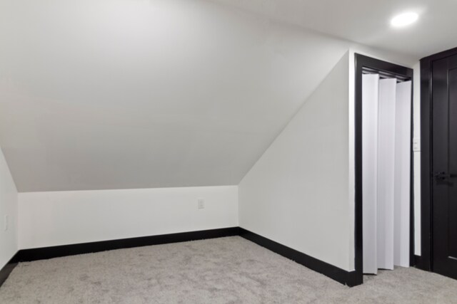 19178 Sherwood St, Detroit, MI 48234 - bonus room featuring carpet floors, baseboards, recessed lighting, and vaulted ceiling