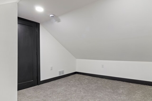 19178 Sherwood St, Detroit, MI 48234 - bonus room featuring vaulted ceiling, carpet flooring, baseboards, and recessed lighting
