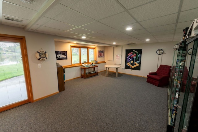 sitting room with carpet flooring, plenty of natural light, baseboards, a paneled ceiling, and recessed lighting