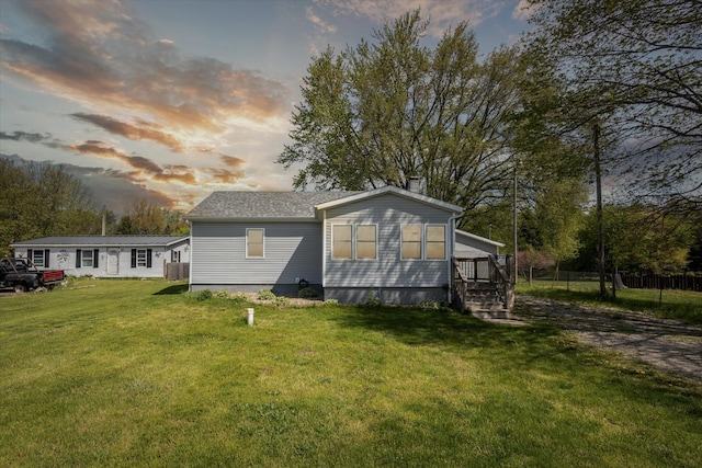25034 Redfield St, Edwardsburg, MI 49112 - rear view of property featuring a chimney