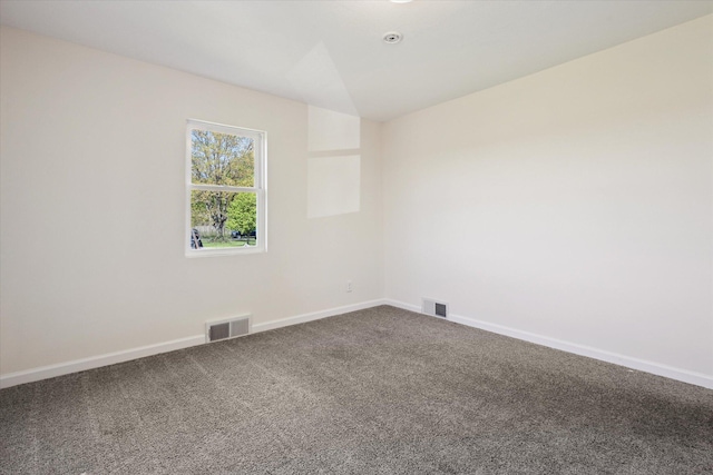 25034 Redfield St, Edwardsburg, MI 49112 - unfurnished room with dark carpet and baseboards