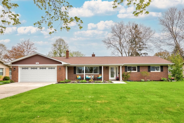 932 E Genesee St, Frankenmuth, MI 48734 - ranch-style home featuring brick siding, an attached garage, a front yard, a chimney, and concrete driveway