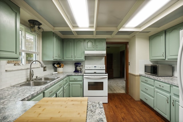 932 E Genesee St, Frankenmuth, MI 48734 - kitchen with green cabinets, electric stove, stainless steel microwave, a sink, and coffered ceiling
