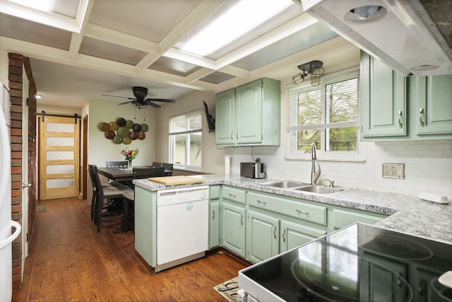 932 E Genesee St, Frankenmuth, MI 48734 - kitchen with dishwasher, green cabinets, a sink, a peninsula, and electric range