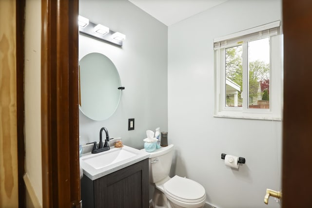 932 E Genesee St, Frankenmuth, MI 48734 - bathroom featuring toilet and vanity
