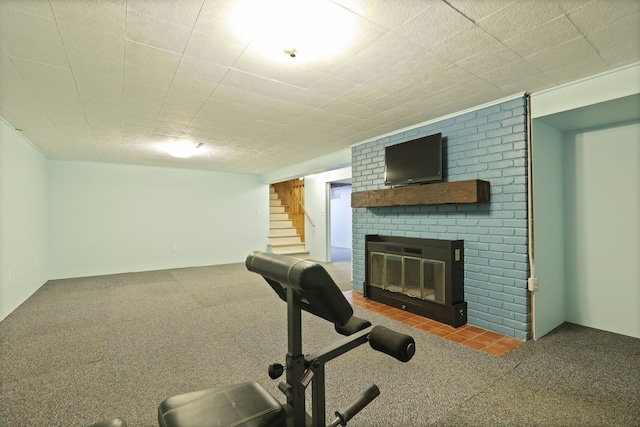 932 E Genesee St, Frankenmuth, MI 48734 - workout room with a brick fireplace and carpet