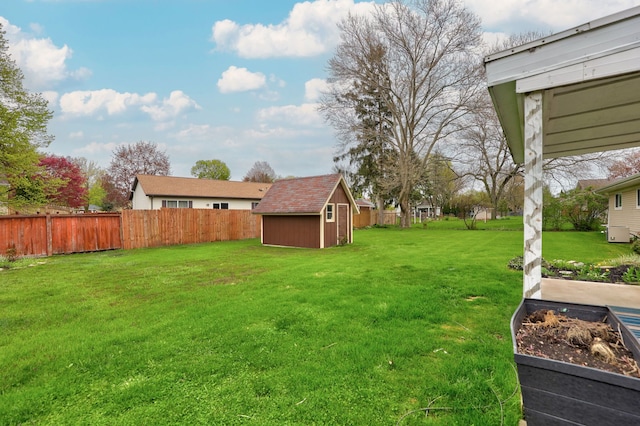 932 E Genesee St, Frankenmuth, MI 48734 - view of yard featuring a storage unit, an outdoor structure, and a garden