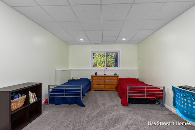 2445 Honey Creek Ave NE, Ada, MI 49301 - carpeted bedroom featuring a paneled ceiling, recessed lighting, and baseboards