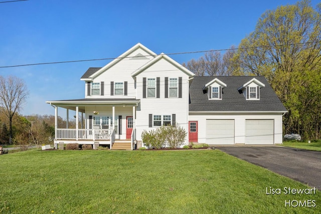 2445 Honey Creek Ave NE, Ada, MI 49301 - view of front facade featuring covered porch, asphalt driveway, a front lawn, and an attached garage