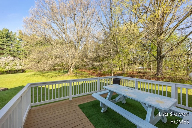 2445 Honey Creek Ave NE, Ada, MI 49301 - wooden terrace featuring a yard