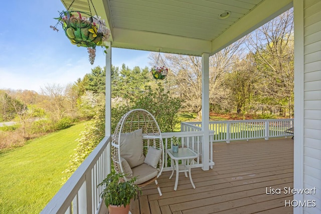 2445 Honey Creek Ave NE, Ada, MI 49301 - wooden terrace featuring a yard