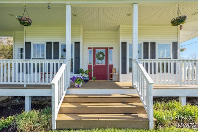 2445 Honey Creek Ave NE, Ada, MI 49301 - doorway to property with a porch