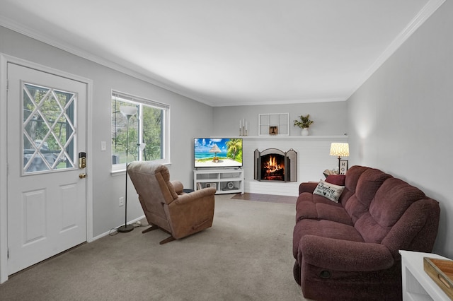 carpeted living room featuring ornamental molding, a brick fireplace, and baseboards