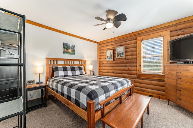10780 S 29th Rd, Cadillac, MI 49601 - bedroom with log walls, carpet, and ceiling fan