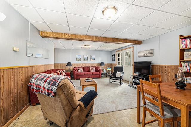 10780 S 29th Rd, Cadillac, MI 49601 - living room with wainscoting, wooden walls, and a drop ceiling