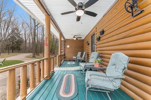 10780 S 29th Rd, Cadillac, MI 49601 - wooden terrace with a ceiling fan and a porch