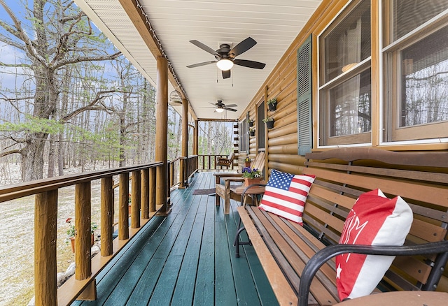 10780 S 29th Rd, Cadillac, MI 49601 - wooden terrace with a ceiling fan and a porch